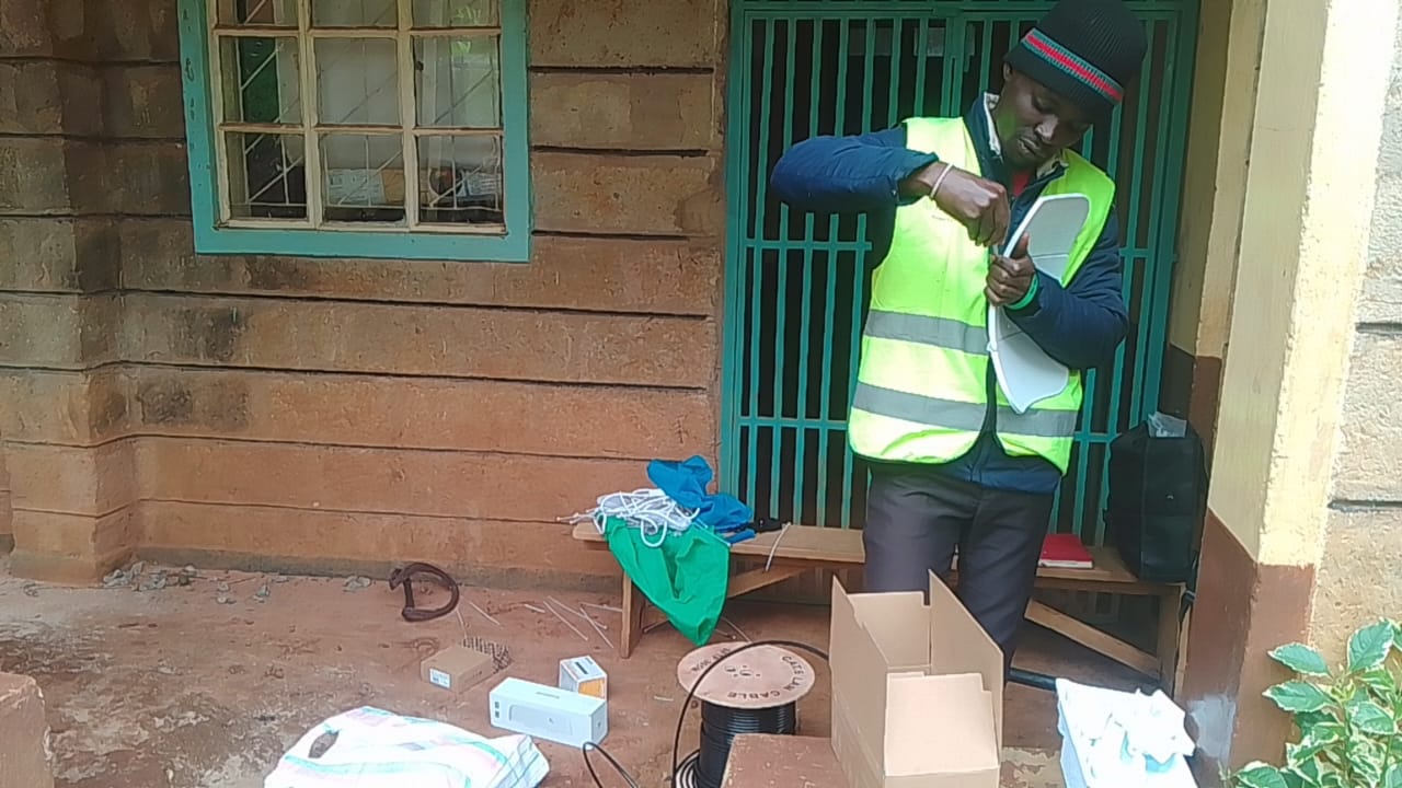 AthiCN technician working with fibre equipment